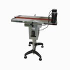 The Cleveland Equipment CE-TRA-37S is a variable speed, bottomless, side belt transfer conveyor